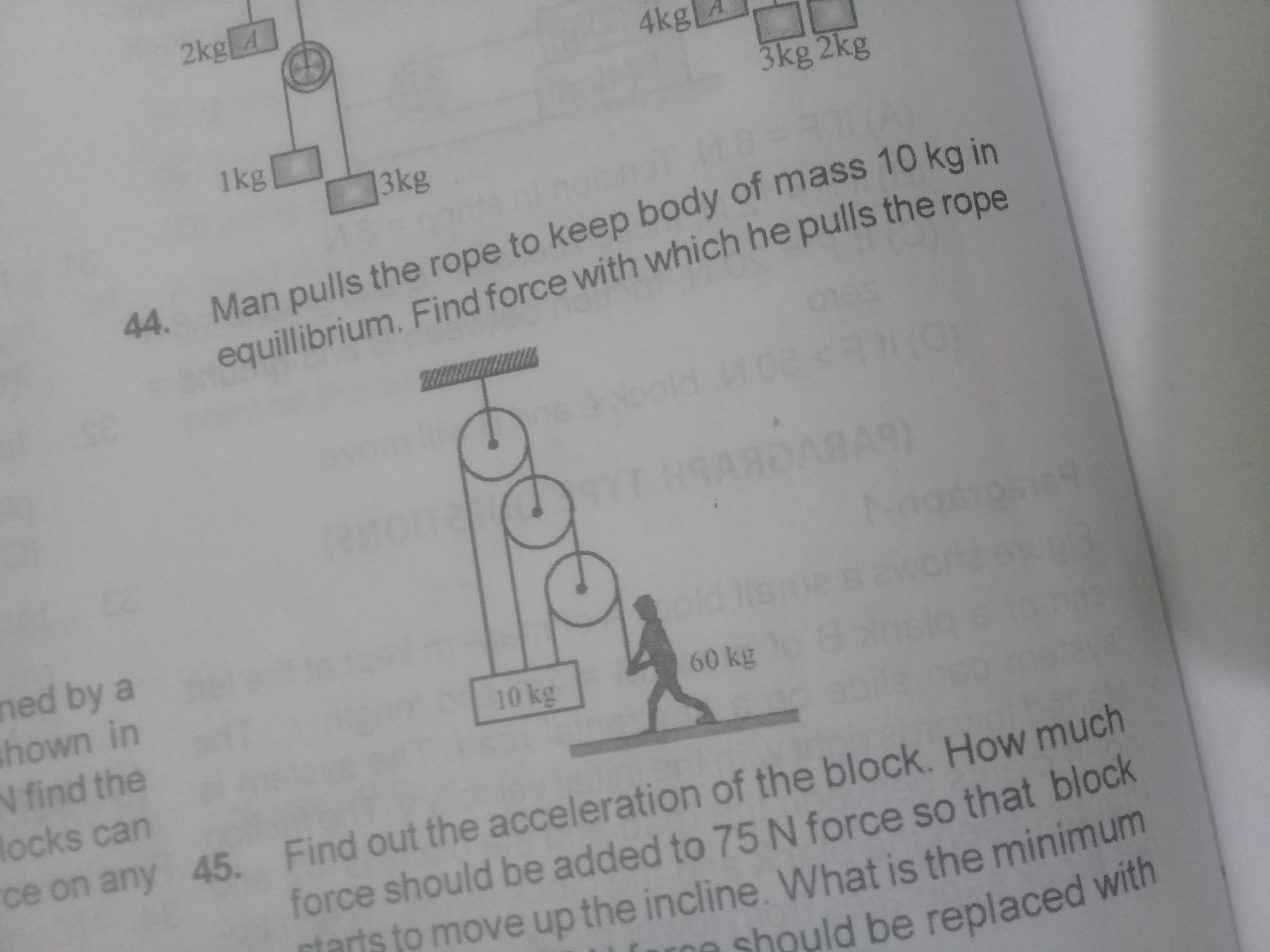 Question image for man pulls the rope to keep body of mass 10 kg in